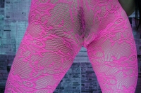 Fetish model in pink see-through leggings