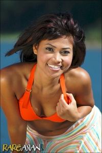 Cute asian babe in orange 
