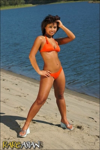 Cute asian babe in orange 