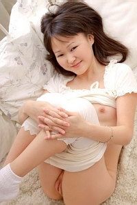Charming asian teen spreading legs